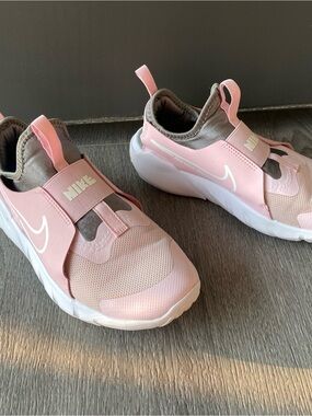Nike Pink Slip-On Sneakers with White Swoosh